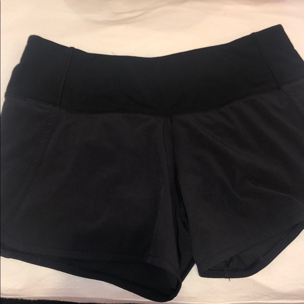 BLACK LULULEMON 4’ SHORTS. NWOT
